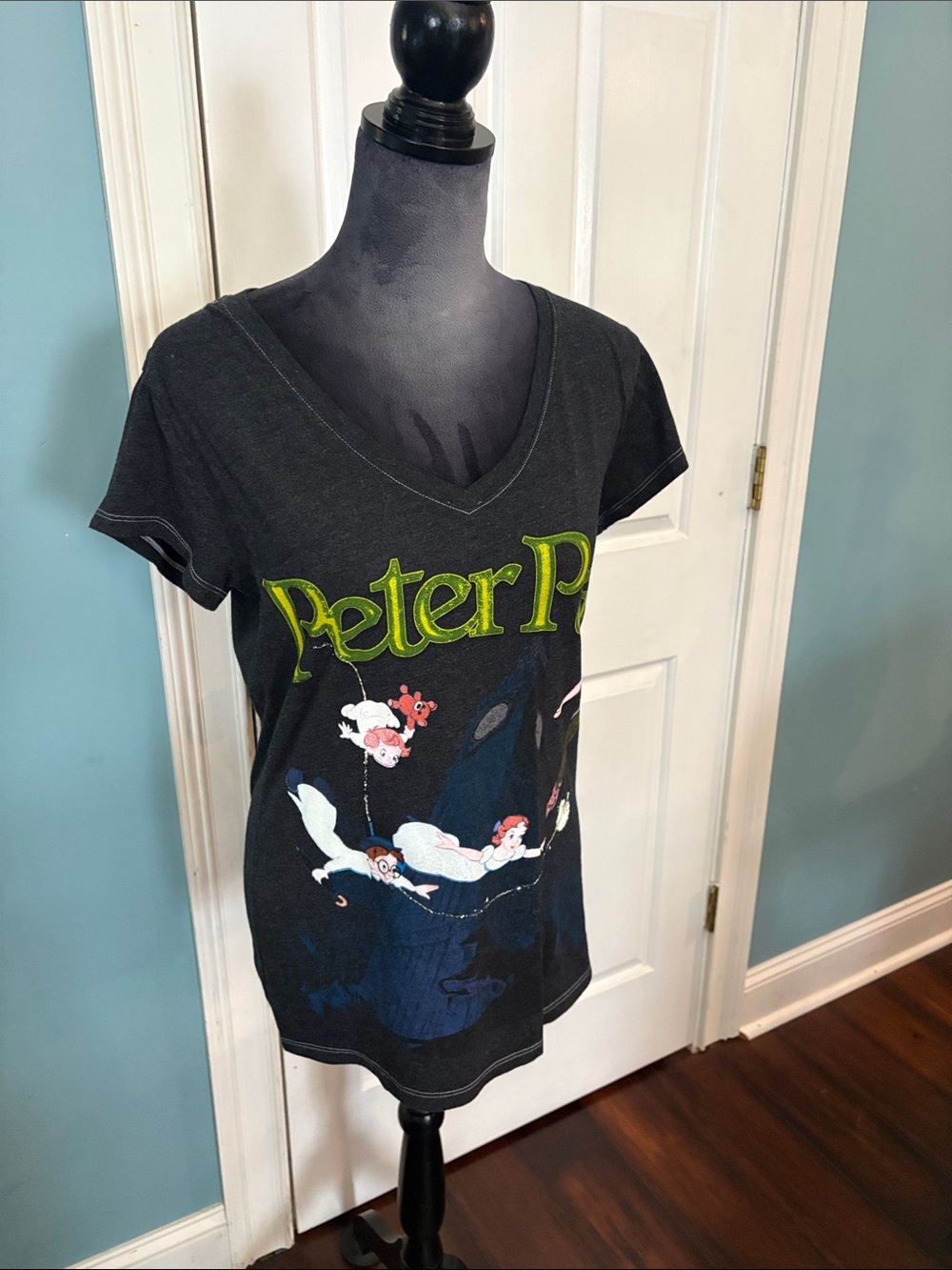 Disney Peter Pan Black Tee with Neon Green Logo and Multicolor Print